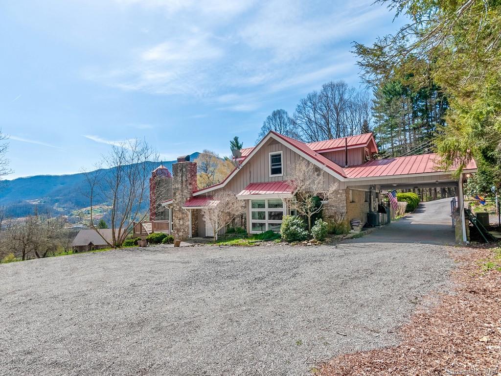950 Walker Road Waynesville, NC 28786 - Photo 29 of 29 a front view of a house with a yard and parking space