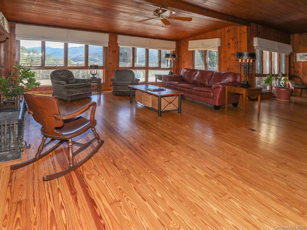 950 Walker Road Waynesville, NC 28786 - Photo 8 of 29 a living room with furniture and a large window