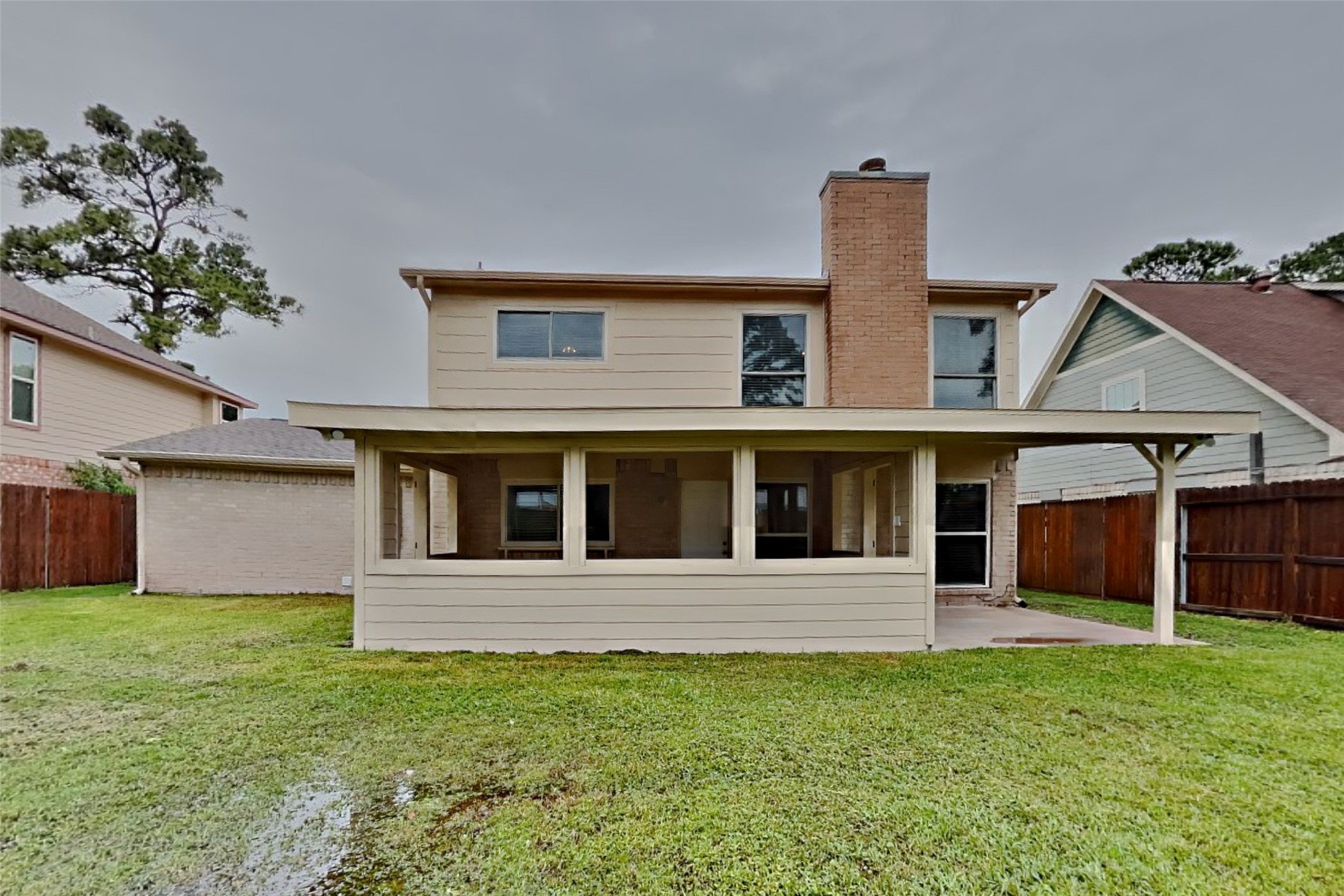10015 Rippling Fields Drive Houston, TX 77064 - Photo 22 of 24 a front view of a house with a yard and garage