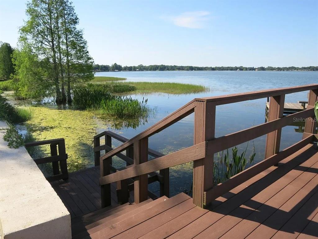 17 Casarena Court Winter Haven, FL 33881 - Photo 2 of 13 a view of a balcony with lake view