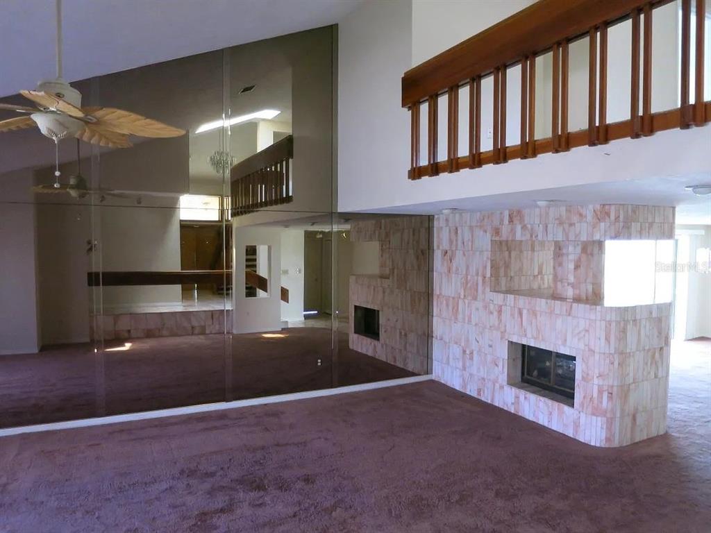 17 Casarena Court Winter Haven, FL 33881 - Photo 3 of 13 a view of a fireplace in a room