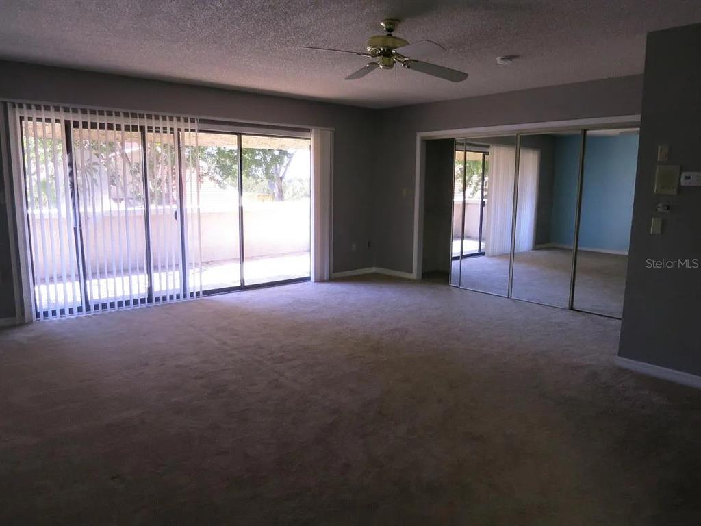17 Casarena Court Winter Haven, FL 33881 - Photo 6 of 13 a view of empty room with windows