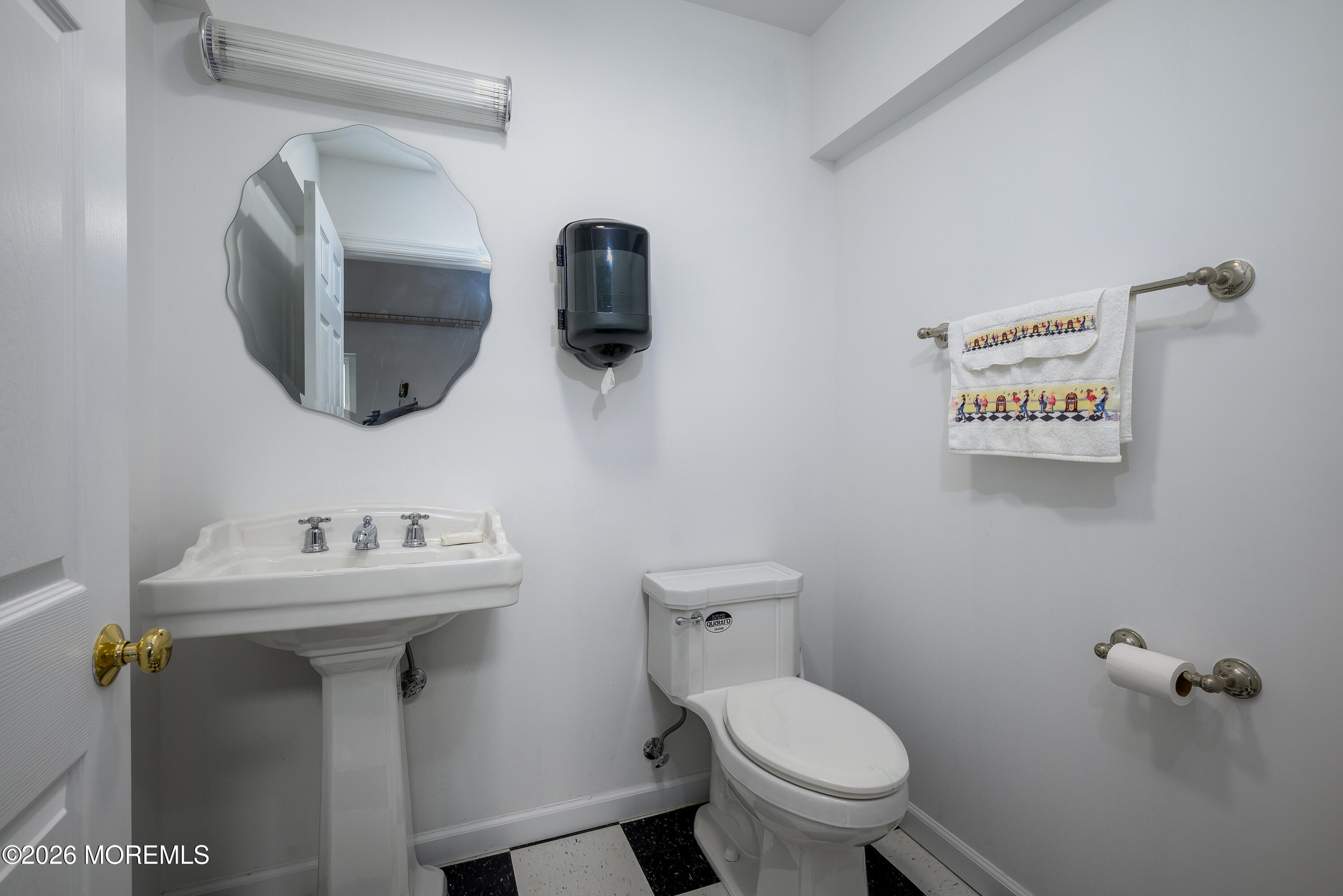 805 Front Street Union Beach, NJ 07735 - Photo 37 of 65 a bathroom with a toilet sink and mirror