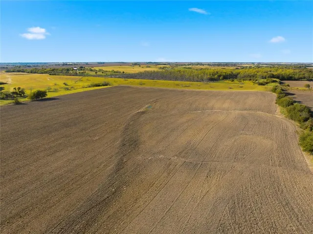 a view of an ocean and city