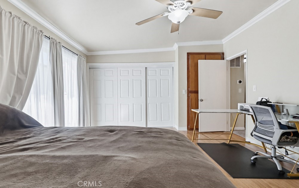 13470 Meyer Road, Unit 22 Whittier, CA 90605 - Photo 28 of 50 a view of a livingroom with a furniture and ceiling fan