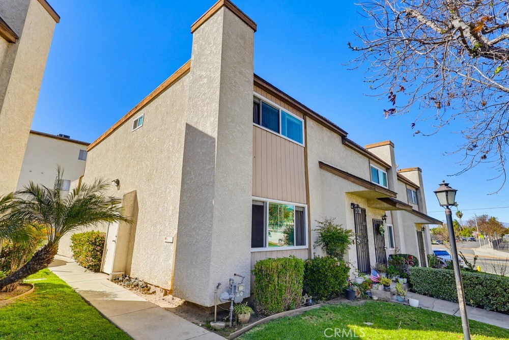 13470 Meyer Road, Unit 22 Whittier, CA 90605 - Photo 3 of 50 a view of a house with a yard