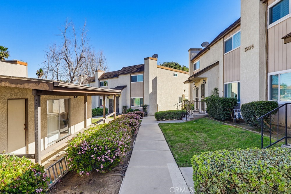 13470 Meyer Road, Unit 22 Whittier, CA 90605 - Photo 40 of 50 a front view of a house with garden