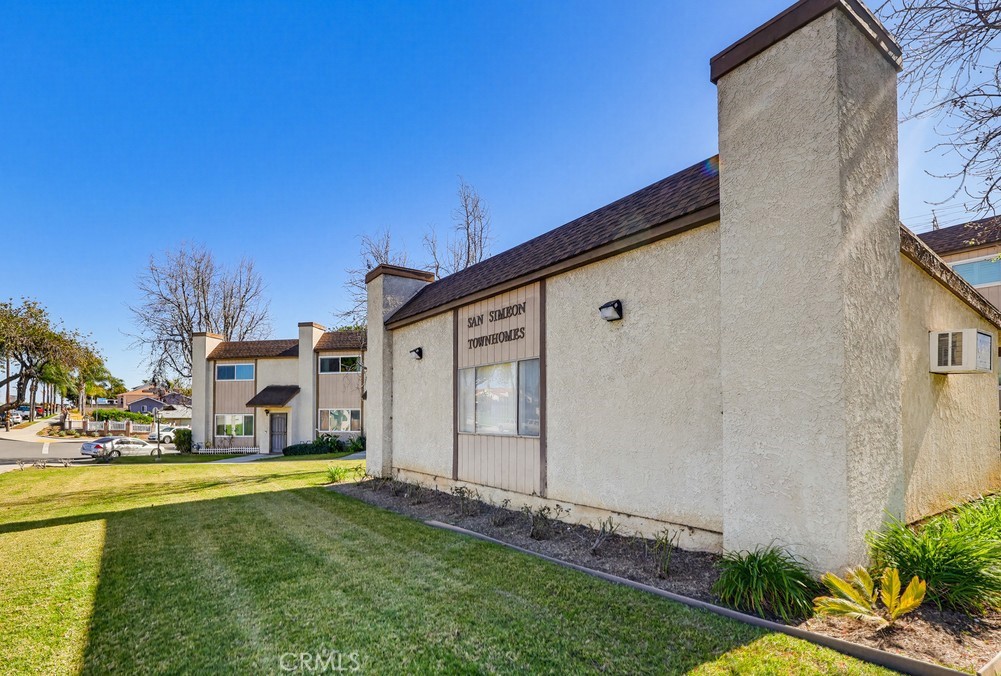 13470 Meyer Road, Unit 22 Whittier, CA 90605 - Photo 44 of 50 a front view of a house with garden
