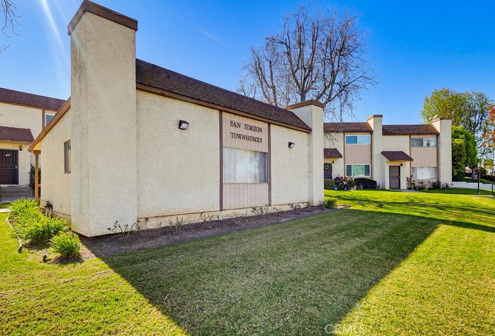 13470 Meyer Road, Unit 22 Whittier, CA 90605 - Photo 45 of 50 a view of a house with backyard and garden