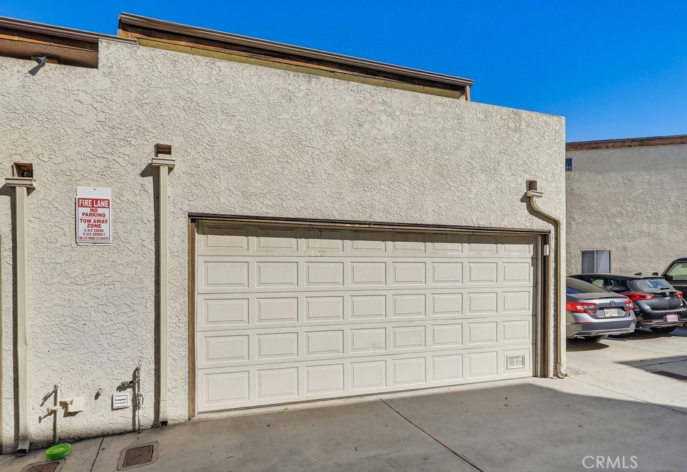 13470 Meyer Road, Unit 22 Whittier, CA 90605 - Photo 48 of 50 a view of a car garage