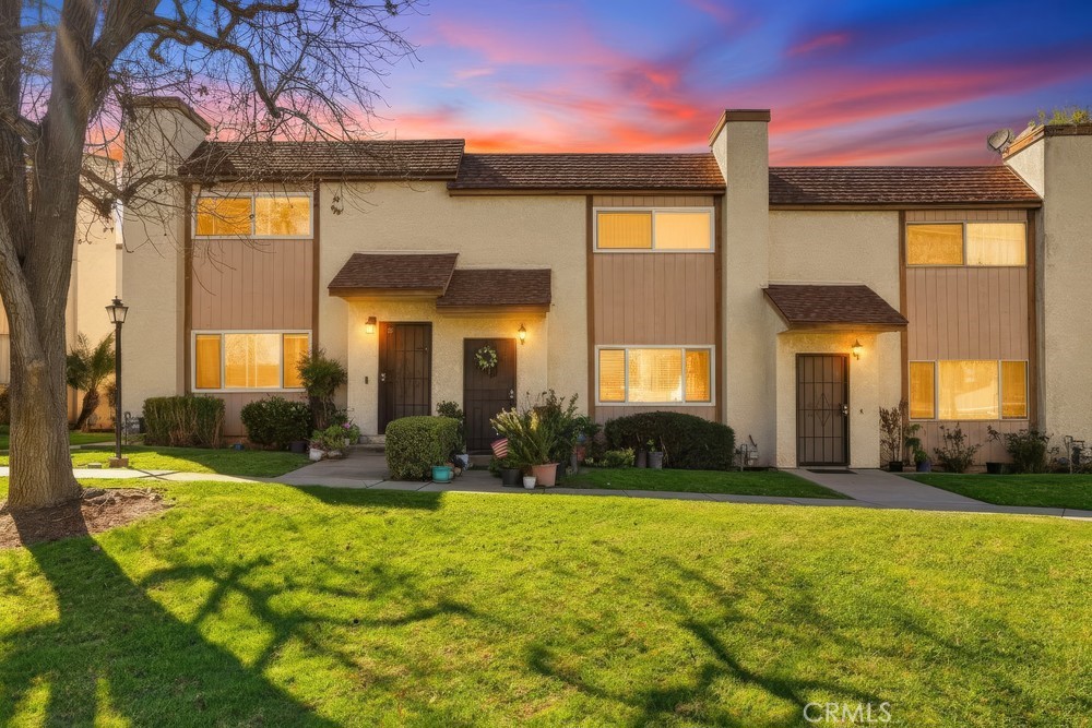 13470 Meyer Road, Unit 22 Whittier, CA 90605 - Photo 49 of 50 a view of a house with a yard