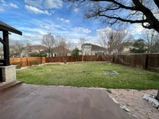 a house view with a garden space