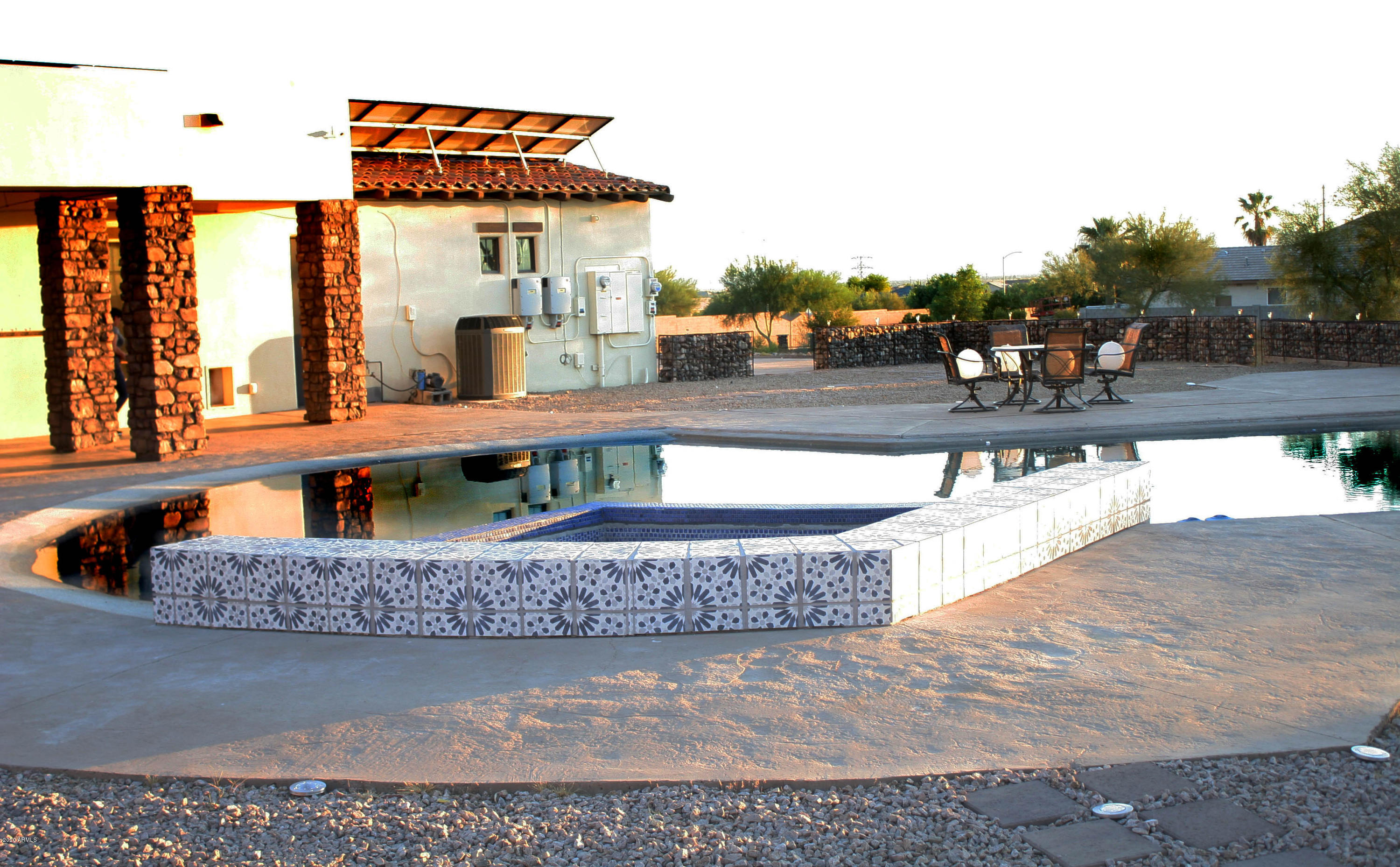 9134 West Happy Valley Road Peoria, AZ 85383 - Photo 50 of 58 backyard sunset