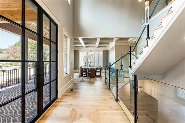 a vase of flowers sitting on a floor