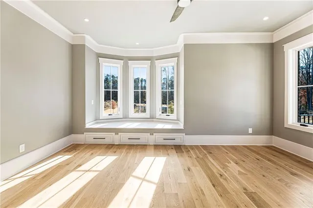 a view of an empty room with a flat screen tv
