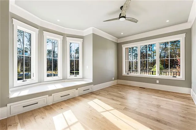 a view of a kitchen with a sink stove and refrigerator