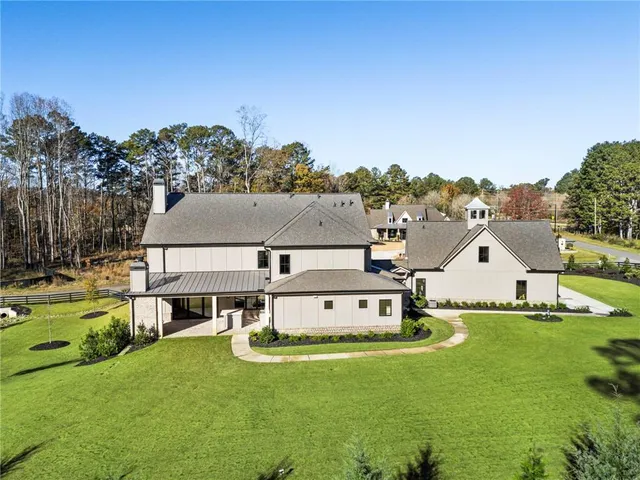 a kitchen with a sink a counter top space and a stove