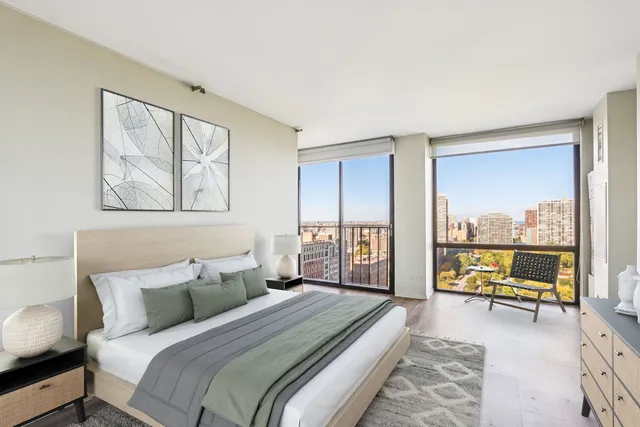 a bed room with a bed and a couch