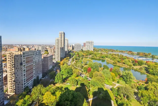 a view of a city with tall buildings in the background