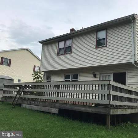 a view of a house with a deck