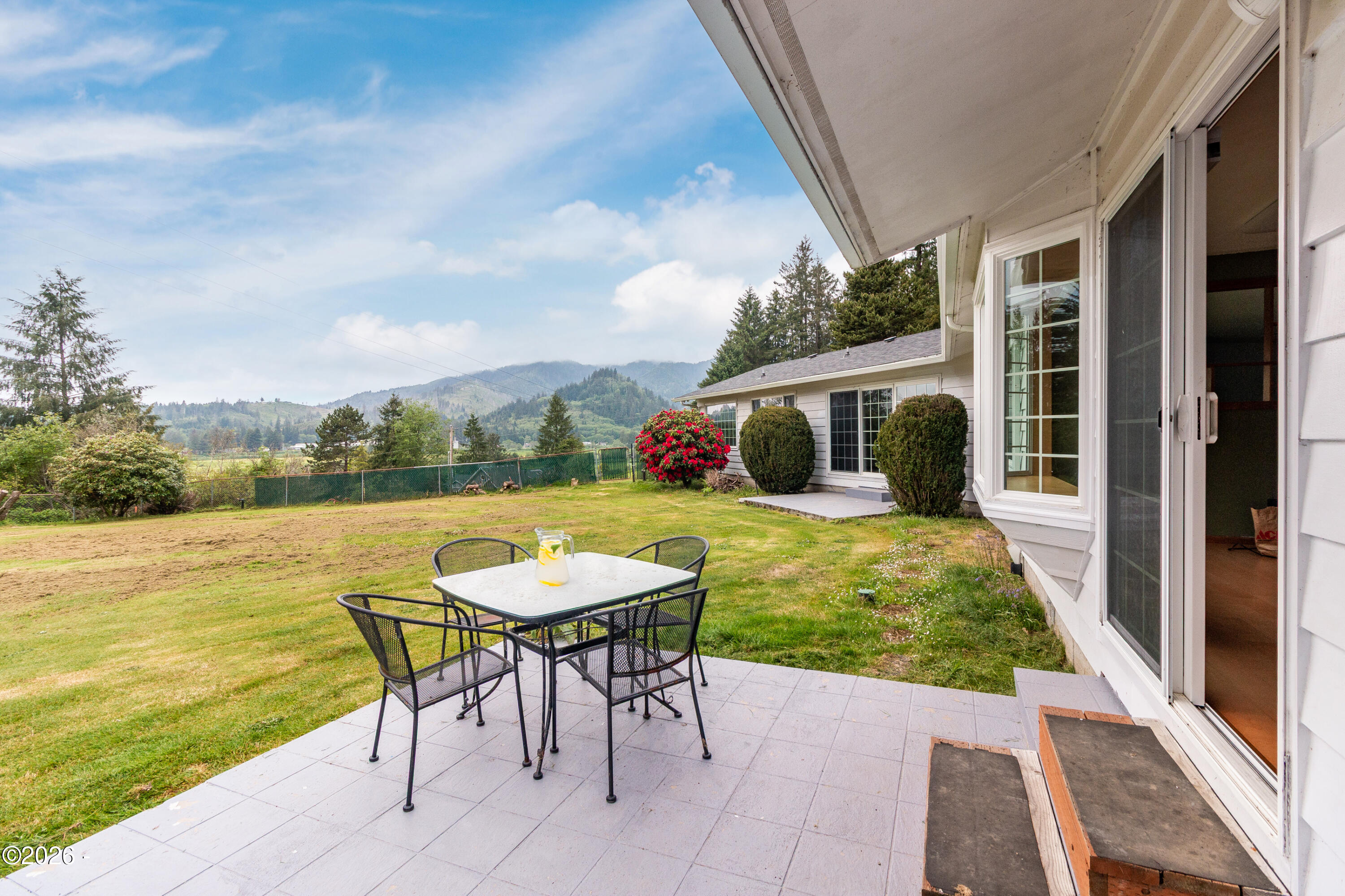 6550 Curl Road Tillamook, OR 97141 - Photo 6 of 50 Back patio off of kitchen