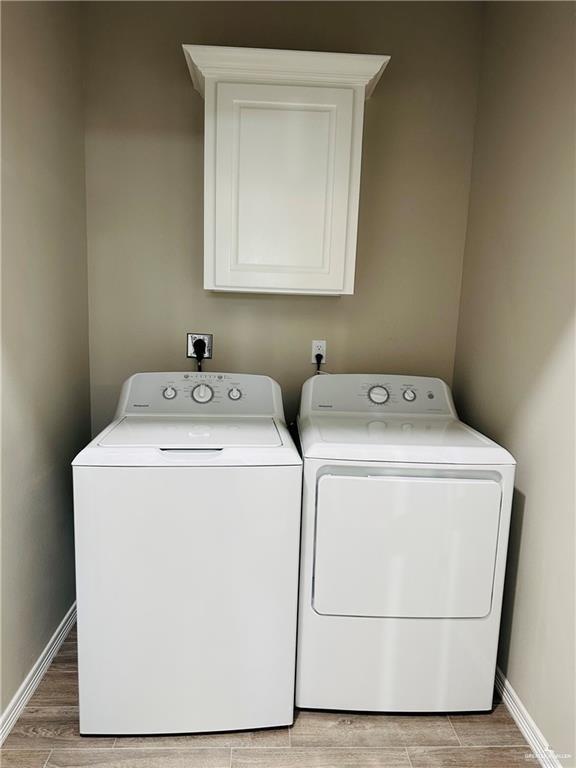 1614 Playa Drive, Unit 2 Weslaco, TX 78596 - Photo 8 of 8 a utility room with dryer and washer