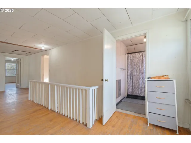 a view of a hallway with closet
