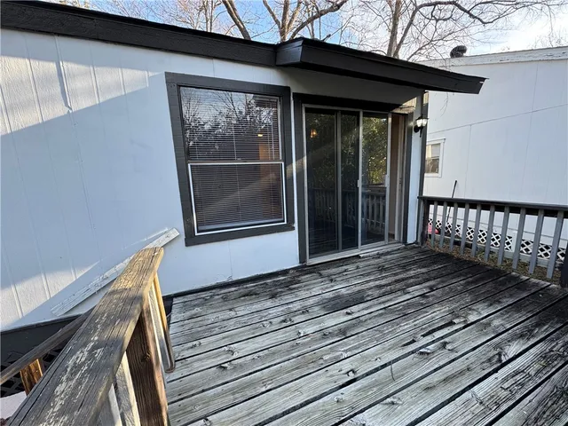 a view of a house with a deck