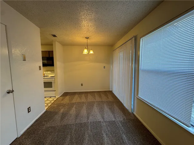 a view of a hallway with an empty space