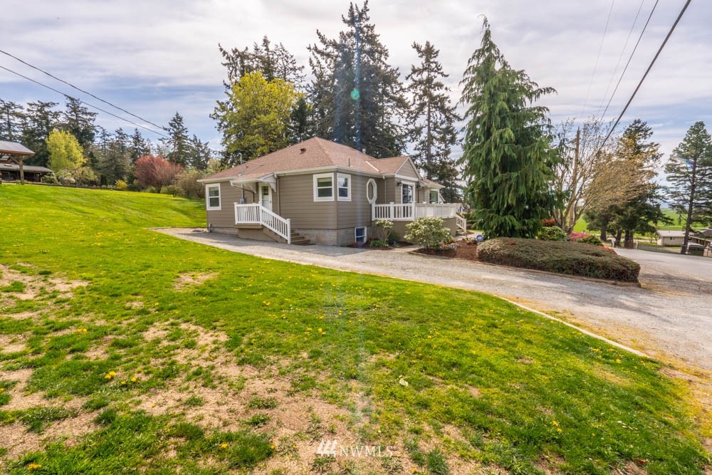 11481 Walker Road Mount Vernon, WA 98273 - Photo 2 of 38 a view of a house with a yard