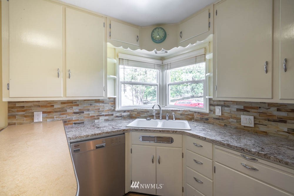 11481 Walker Road Mount Vernon, WA 98273 - Photo 13 of 38 a kitchen with sink stove and refrigerator