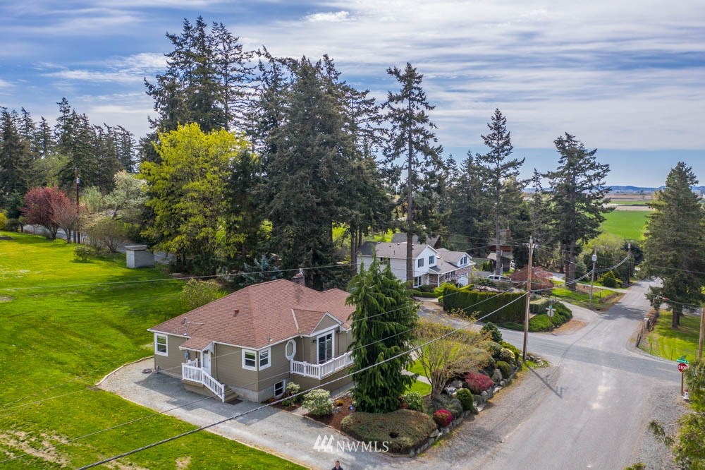 11481 Walker Road Mount Vernon, WA 98273 - Photo 3 of 38 a view of a house with a yard and lake view