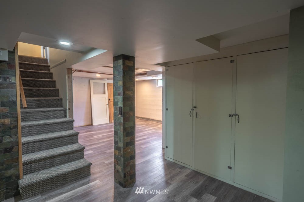 11481 Walker Road Mount Vernon, WA 98273 - Photo 24 of 38 a view of a hallway with wooden floor and entryway