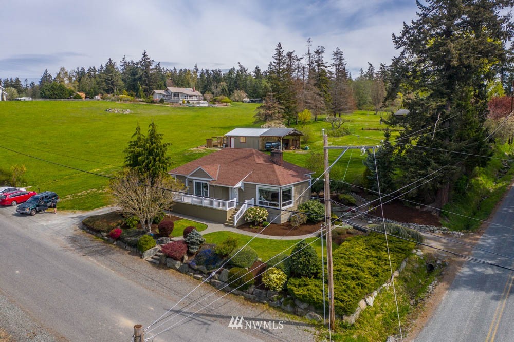 11481 Walker Road Mount Vernon, WA 98273 - Photo 4 of 38 an aerial view of a house with outdoor space and lake view