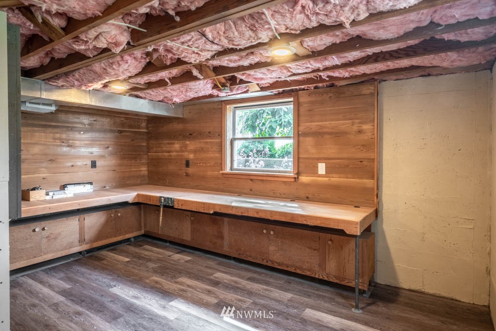 11481 Walker Road Mount Vernon, WA 98273 - Photo 31 of 38 a view of a kitchen with a sink and wooden floor