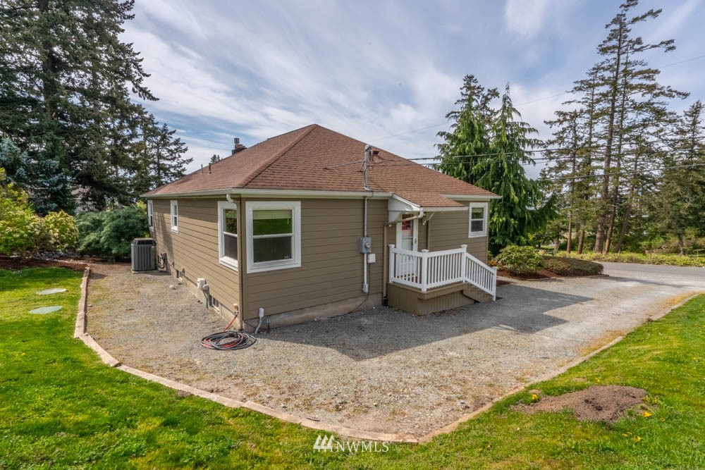 11481 Walker Road Mount Vernon, WA 98273 - Photo 37 of 38 a view of a house with a yard porch and sitting area