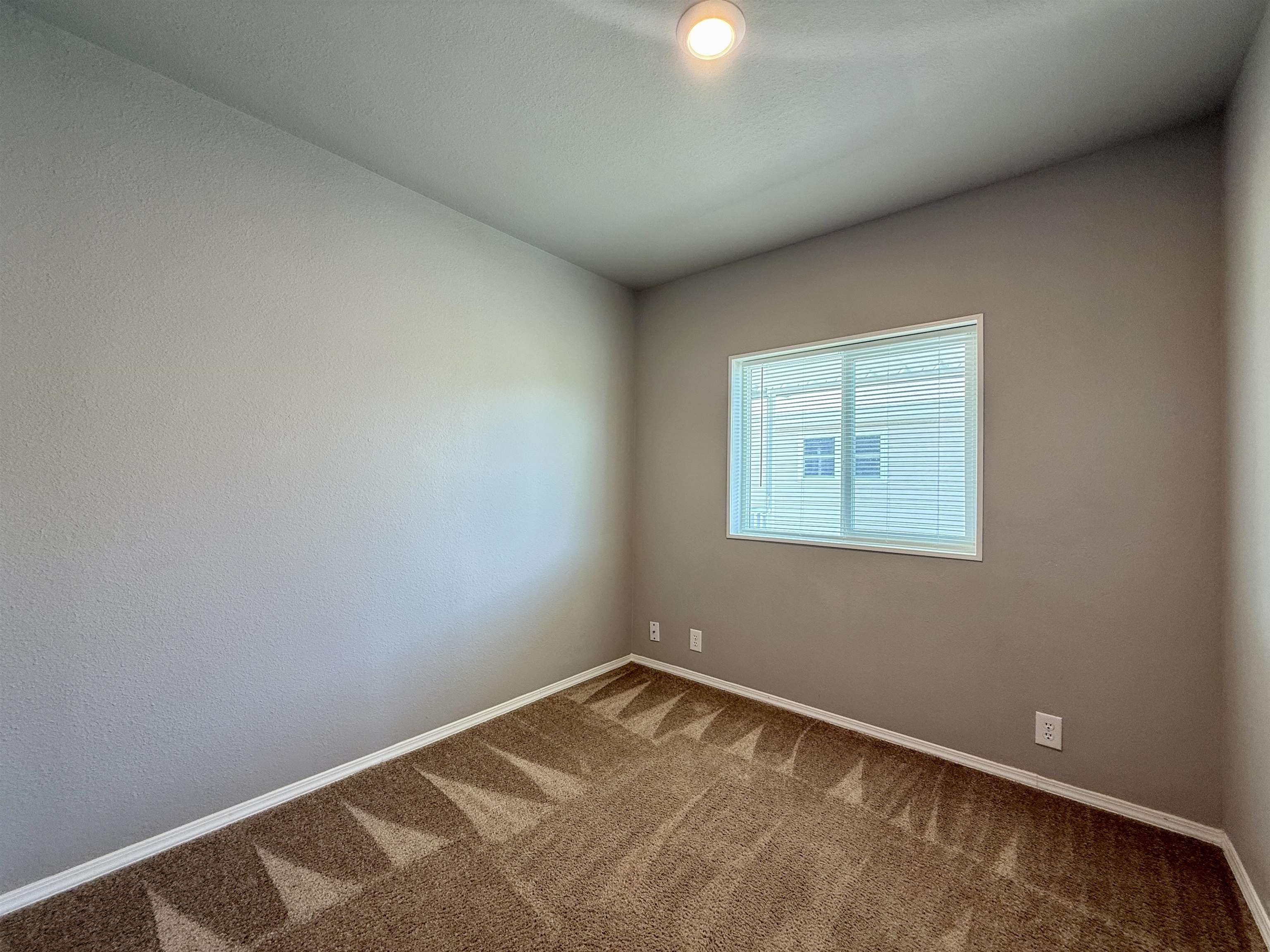 435 32 Road, Unit 830 Clifton, CO 81520 - Photo 20 of 28 an empty room with a window