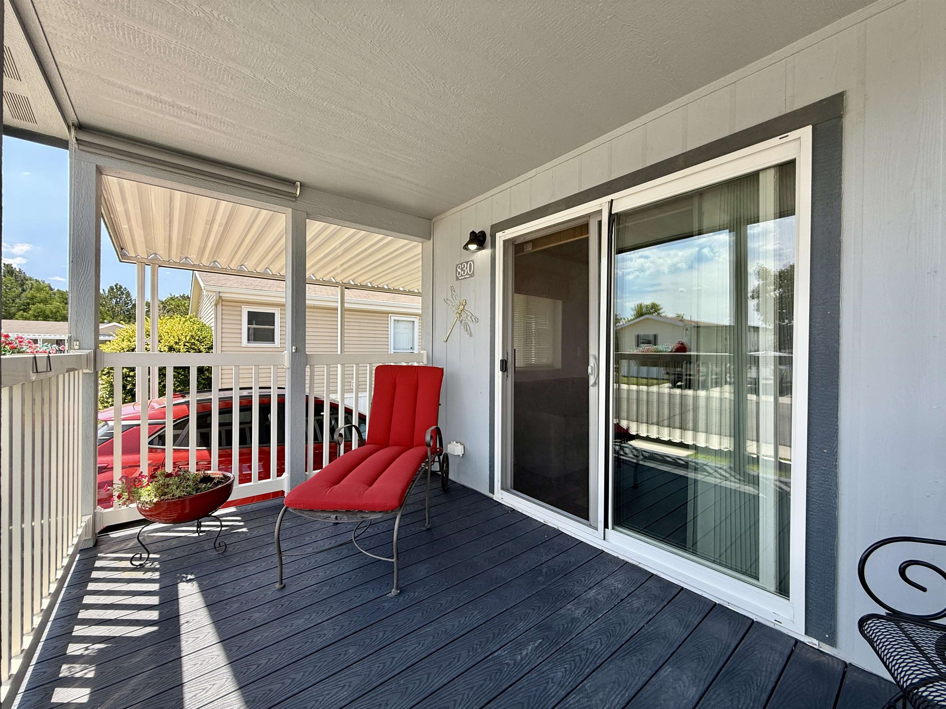 435 32 Road, Unit 830 Clifton, CO 81520 - Photo 22 of 28 a view of a room with wooden floor and furniture