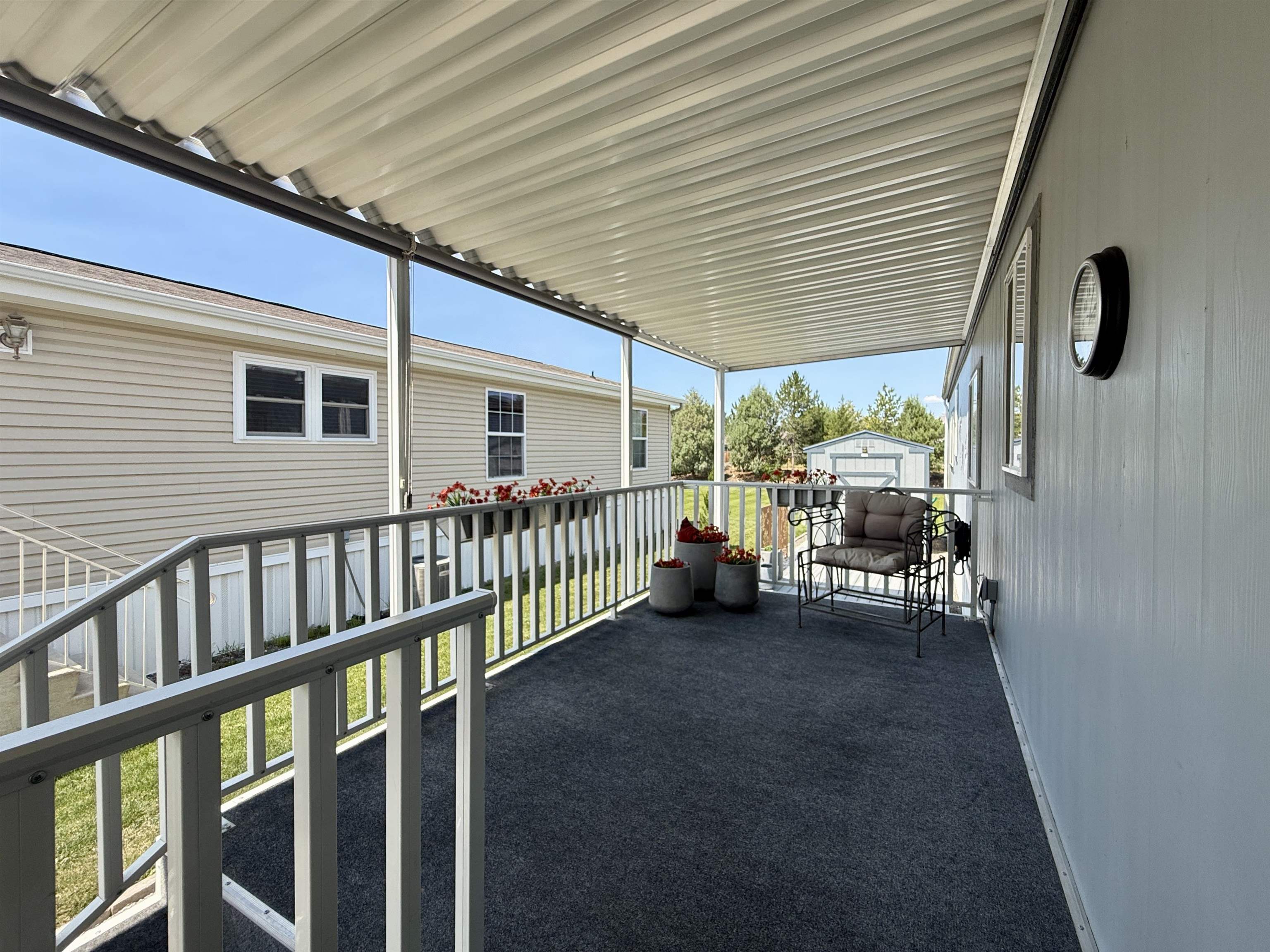 435 32 Road, Unit 830 Clifton, CO 81520 - Photo 23 of 28 a view of a chair and tables in the balcony