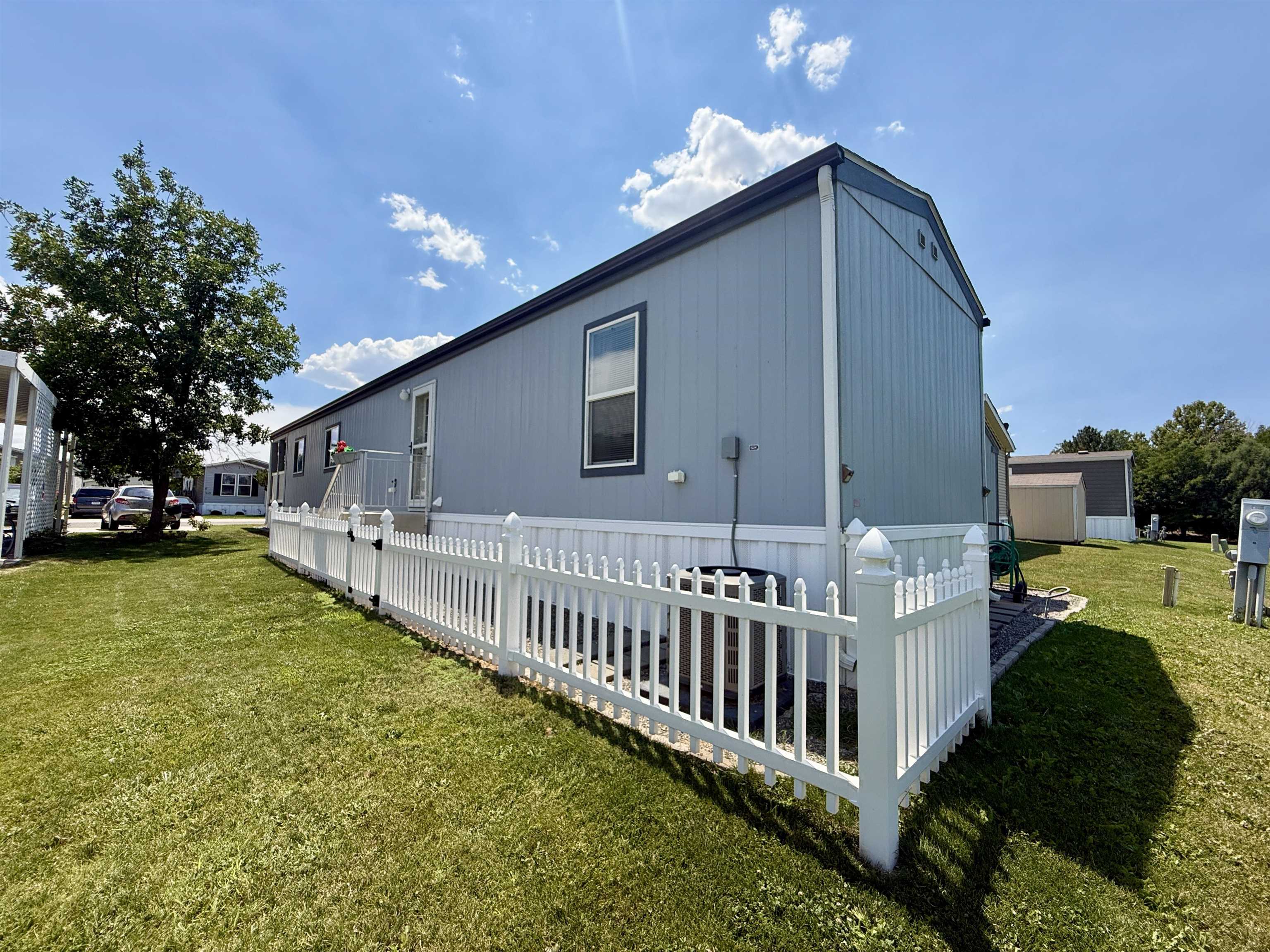 435 32 Road, Unit 830 Clifton, CO 81520 - Photo 27 of 28 a view of a house with backyard and sitting area