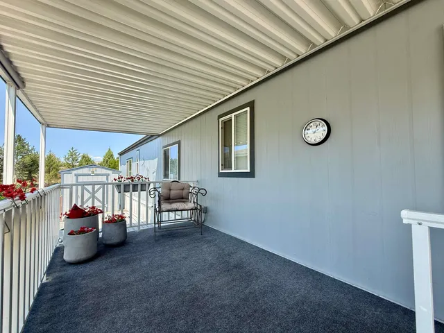 a view of a porch with furniture