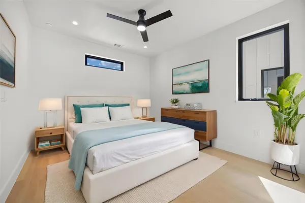 a view of closet with wooden floor