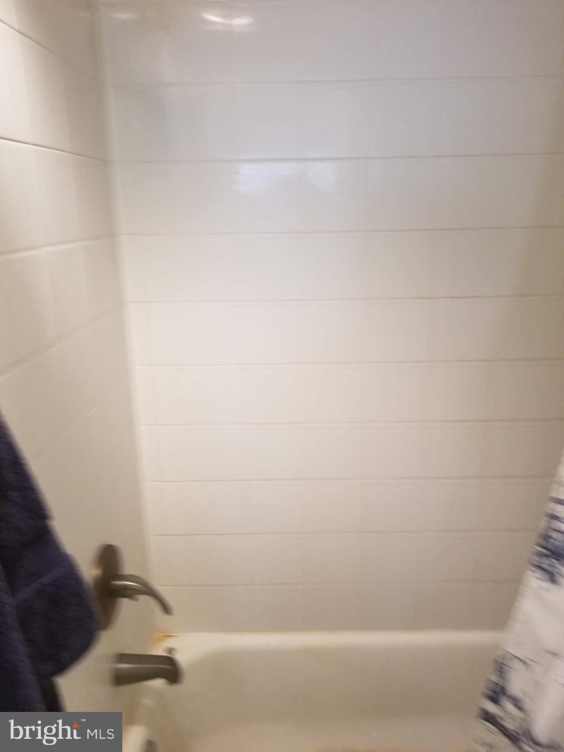 1420 N Street Northwest, Unit 407 Washington, DC 20005 - Photo 16 of 20 Bathroom tile