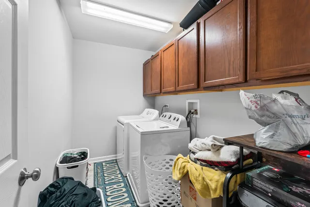 a room with a stove and a wooden floor