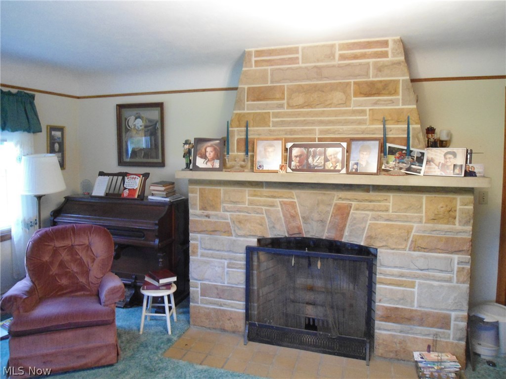 3435 Huffman Road Medina, OH 44256 - Photo 4 of 15 The rustic stone fireplace has adds a warm presence to the Living Room.