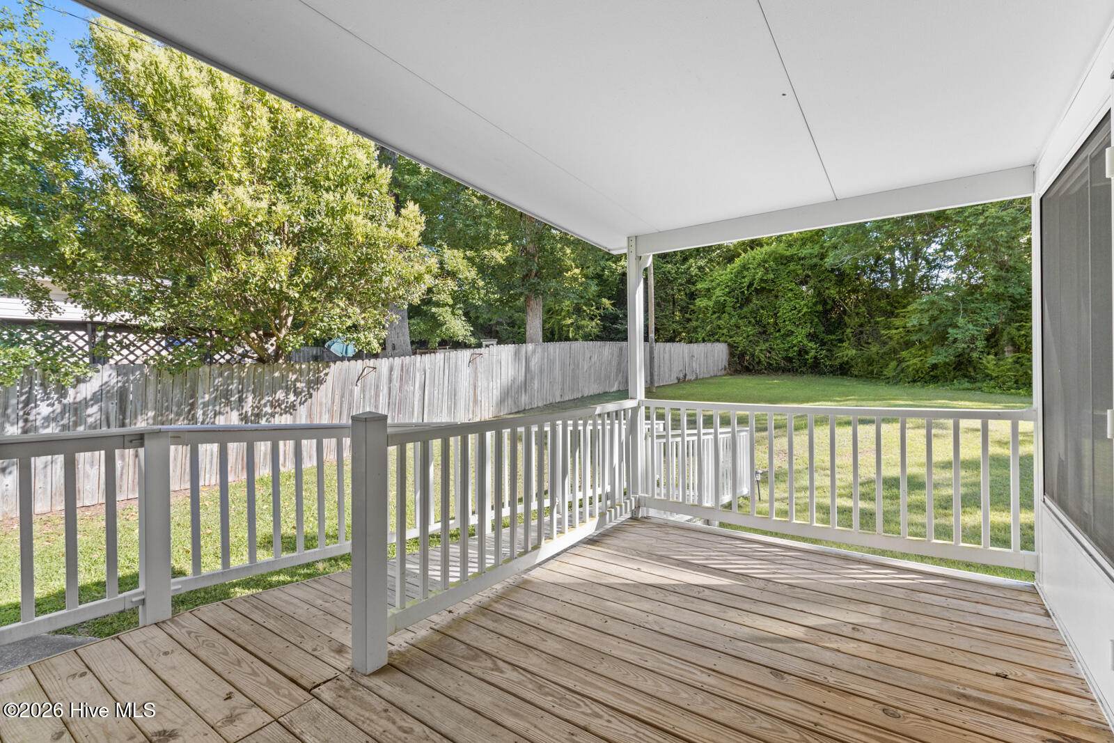 6 Laran Road Jacksonville, NC 28540 - Photo 37 of 41 The Covered Deck With Ramp Leads Into The Backyard