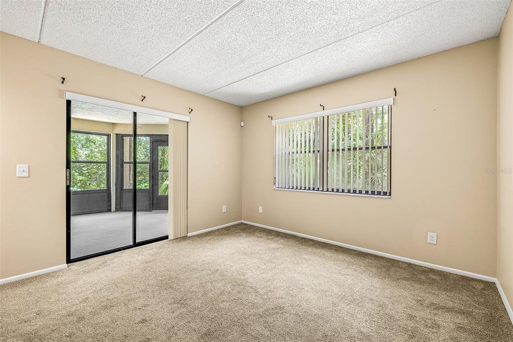 125 Woodlake Wynde Oldsmar, FL 34677 - Photo 15 of 20 an empty room with windows
