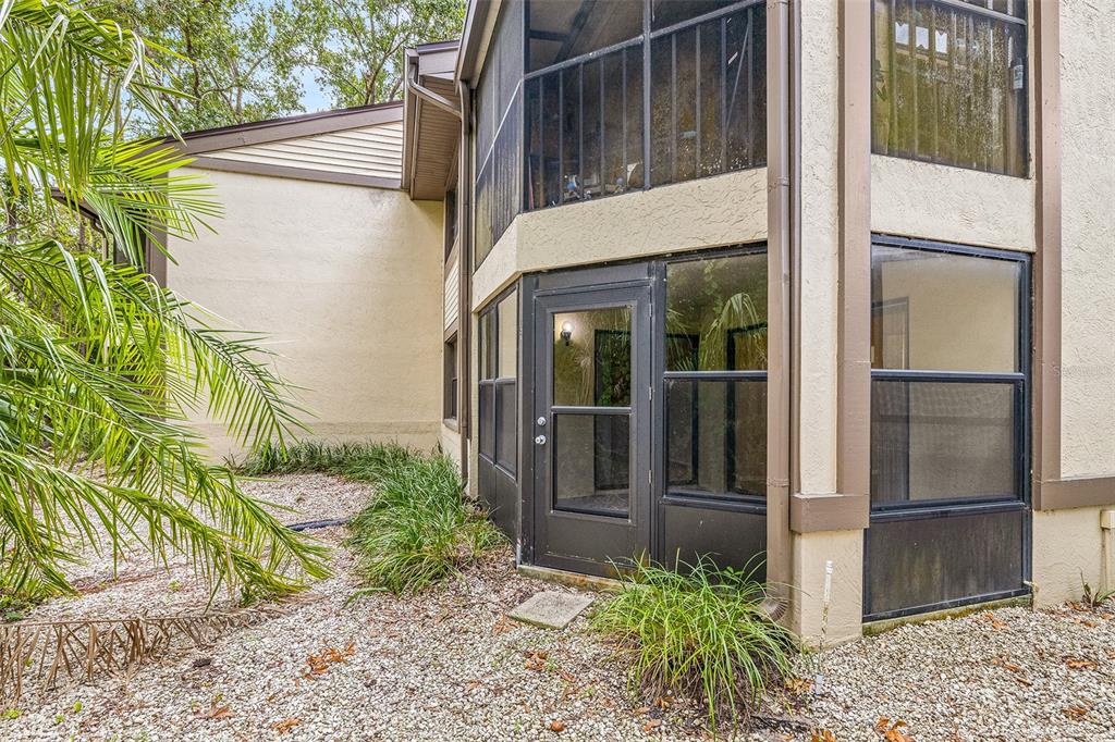 125 Woodlake Wynde Oldsmar, FL 34677 - Photo 19 of 20 a view of a house with a door and wooden floor