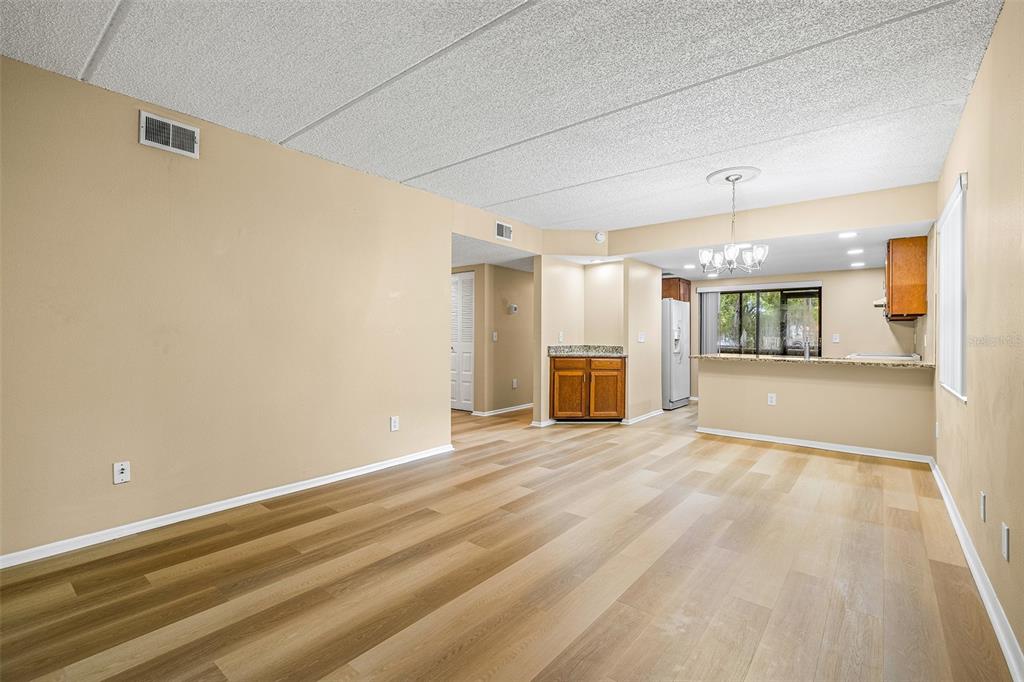 125 Woodlake Wynde Oldsmar, FL 34677 - Photo 7 of 20 an empty room with a empty space and windows