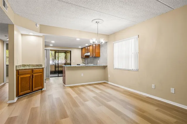 a view of a kitchen with a sink cabinets and a kitchen